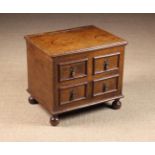 An 18th Century Oak Box Stool with dummy-front.