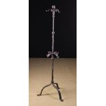 An Attractive Wrought Iron Floor Standing Candle Holder.