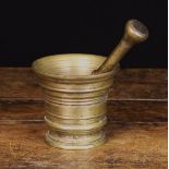 An 18th Century Bronze Ring turned Pestle & Mortar, the pestle 19 cm in length (7½"),