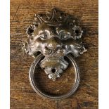 An Early 17th Century Cast Bronze Lion Mask Ring Handle 14 cm high, 9 cm wide, 5½" h. 3½" w.