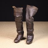 A Matched Pair of 17th or 18th Century Leather Cavalryman's Thigh-length Boots with hob nailed