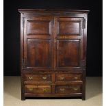 An 18th Century Joined Oak Cupboard.