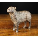 A Small Cast Bronze Lamb, possibly 17th Century, 11 cm high, 13 cm in length (4¼" h. 5 l.