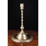 A 17th Century Brass Hispano-Moresque Candlestick.