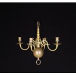 A Small 19th Century Four-branch Brass Chandelier with zoomorphic candle arms pegged to a discoid