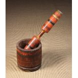 A Large & Unusual Turned Treen Pestle & Mortar painted with decorative striped bands.