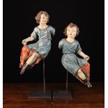 A Pair of 16th/Early 17th Century Carved Wooden Angels with polychrome paintwork.