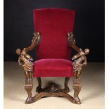 An Exuberant 19th Century Venetian Carved Walnut Armchair.