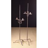 Two Similar 18th Century Wrought Iron Floor Standard twin-socket Candle Holders on height