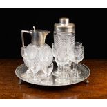 A Silver Mounted Crystal Claret Jug with hobnail cut globular body,