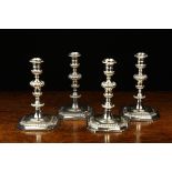 A Set of Four 19th Century Silver Plated Candlesticks in the William & Mary Style The gadrooned &