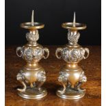A Pair of Small 19th Century Japanese Bronze Pricket Candlesticks with decoratively cast bulbous