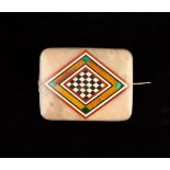 A Micro-mosiac Brooch inlaid in coloured stones with a diamond shaped chequer board.
