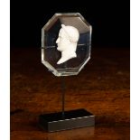 A 19th Century Glass Cameo Panel carved and silvered with the bust of Napoleon in a bevelled