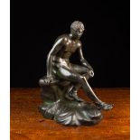 A Late 18th Century Italian Bronze Figure of Mercury sat on a rocky outcrop 12" (30.5 cm) in height.