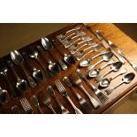 A Composite Set of Georgian Silver Flatware for twelve place settings comprising of tablespoons &