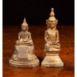 Two Small Antique Cast Bronze Tibetan Buddhas, one with residual gilding 4¾" (12 cm) in height,