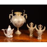 A Pair of African Brass Heads with horned headdresses,