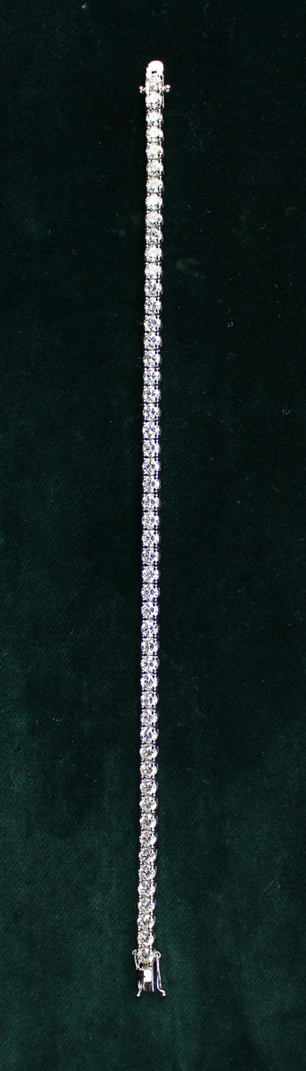 A Fine Diamond Bracelet composed of a chain of 51 round brilliant cut stones, total weight 7. - Image 3 of 3