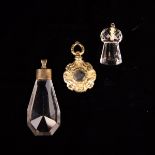 Two Cut Crystal Pendants; one in the form of a thistle head, and a Gilt Fob with central receptacle.