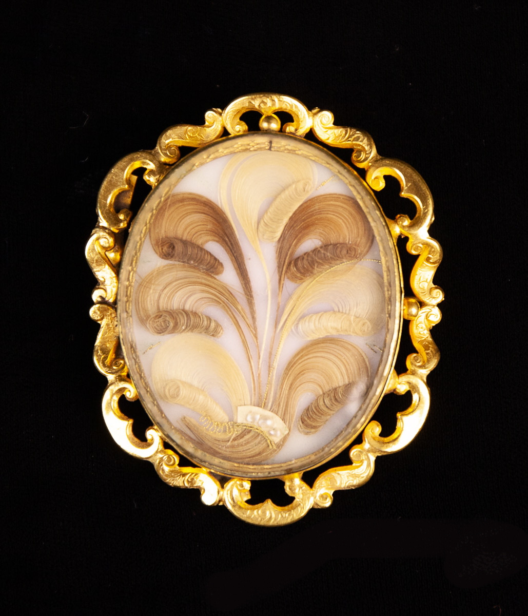 A 19th Century Pinchbeck & Hair Brooch.