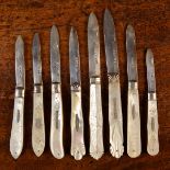 Eight 19th/Early 20th Century Folding Silver Fruit Knifes with mother-of-pearl faced handles,