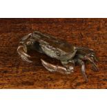 A Small Brown Patinated Bronze Crab, 4" (10 cm) wide, 3" (7.5 cm) deep.