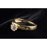 A 14 Carat Yellow Gold & Diamond Ring set with a round brilliant cut diamond measuring approx 5.