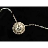 A Diamond Pendant on Chain set with a .44 carat round brilliant cut stone surrounded by 0.