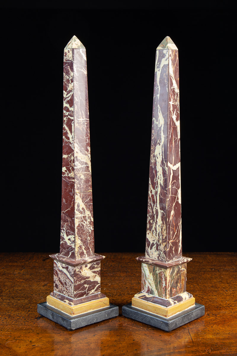 A Pair of 19th Century 'Grand Tour' Figured Griotte Marble Obelisks raised on square Senia marble