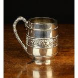 A Pretty Victorian Silver Christening Mug embossed with strings of beading and a band of scrolling