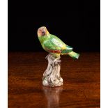 A Meissen Porcelain Model of a Parrot perched on a tree stump,