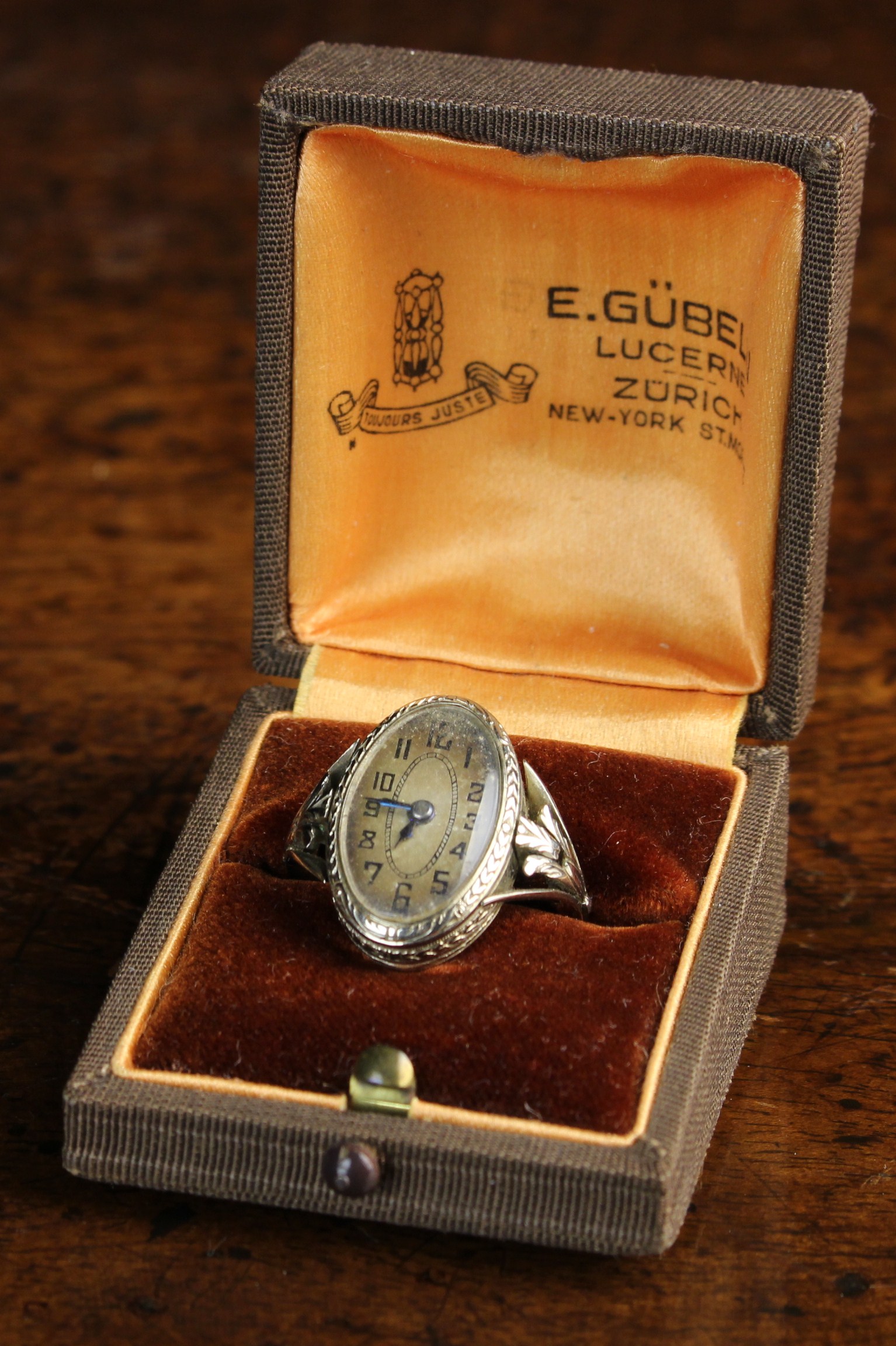 A Platinum Swiss Made Lady's Watch Ring by Gübelin, Circa 1930 with an oval dial,