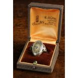 A Platinum Swiss Made Lady's Watch Ring by Gübelin, Circa 1930 with an oval dial,