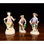 Three Meissen Porcelain Figures: Two gardeners in decorative costume;