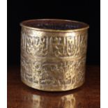 An Antique Repoussé Brass Islamic Pot.