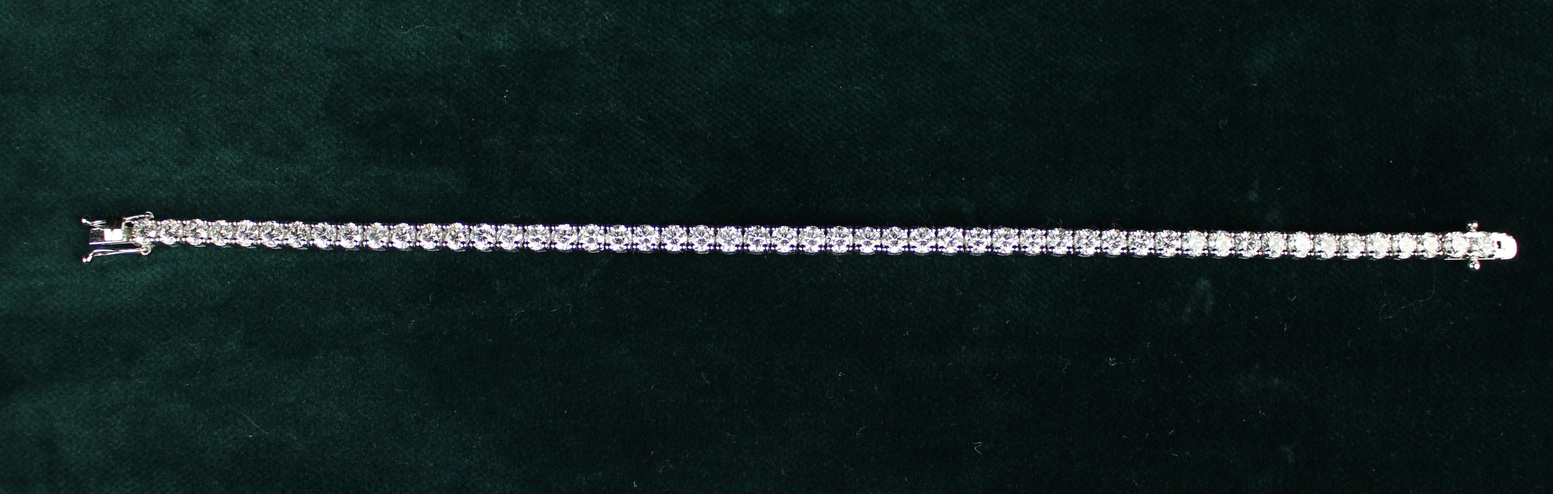 A Fine Diamond Bracelet composed of a chain of 51 round brilliant cut stones, total weight 7. - Image 2 of 3