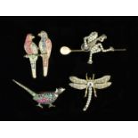 Four Charming Brooches; One in the form of a frog strumming a mandolin with diamonds,