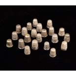 A Collection of 23 Victorian & Later Silver Thimbles.