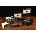 A Collection of Instamatic Cameras to include: A Zeiss Ikon Ikomatic A with leather case Circa 1964.