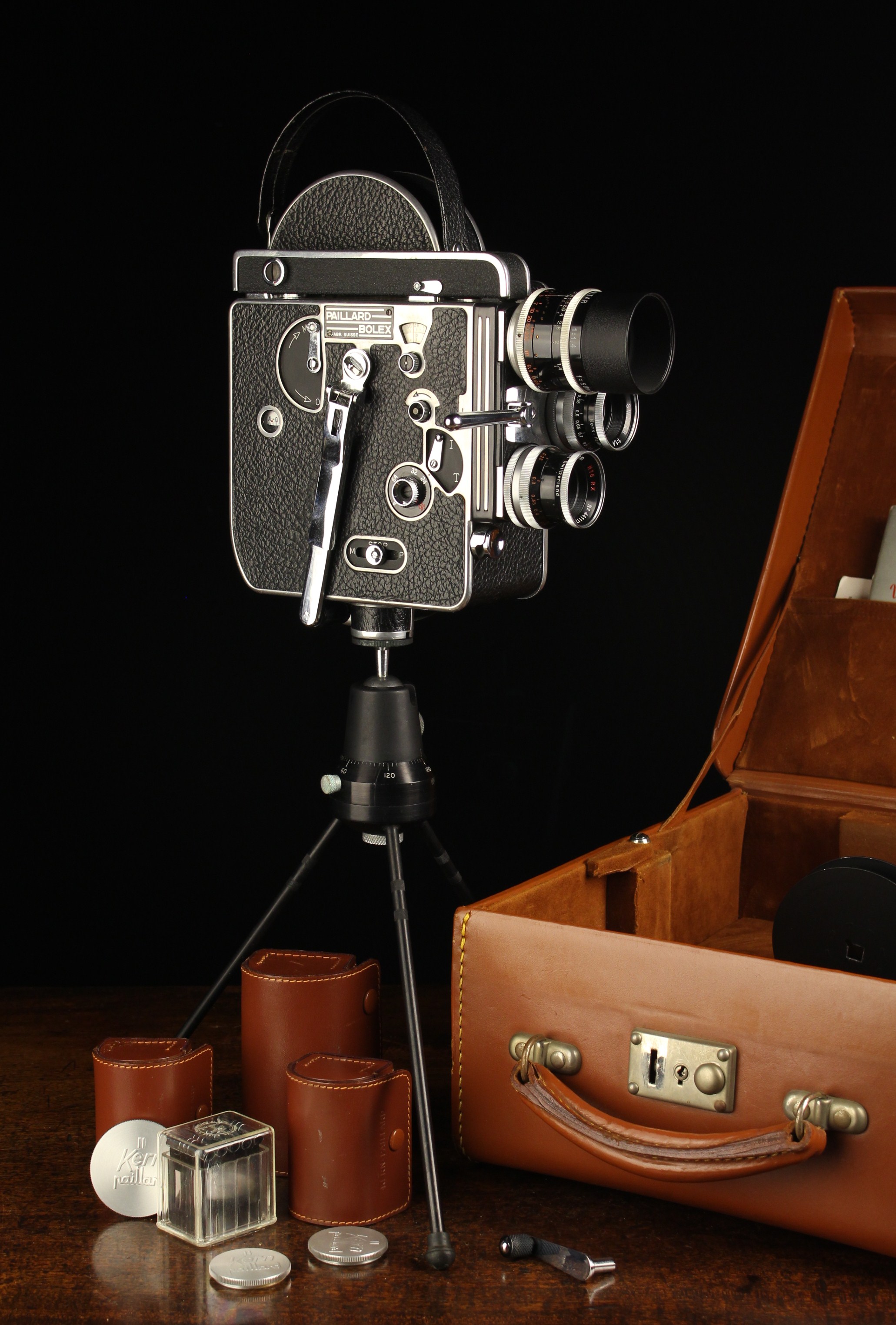 A Vintage Paillard Bolex H-16 Reflex Cine Camera with three Kern-Paillard Switar lenses; 50 mm f 1.