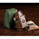 A Vintage Coronet Midget Brown Marbled Bakelite Camera by Coronet Camera Co.