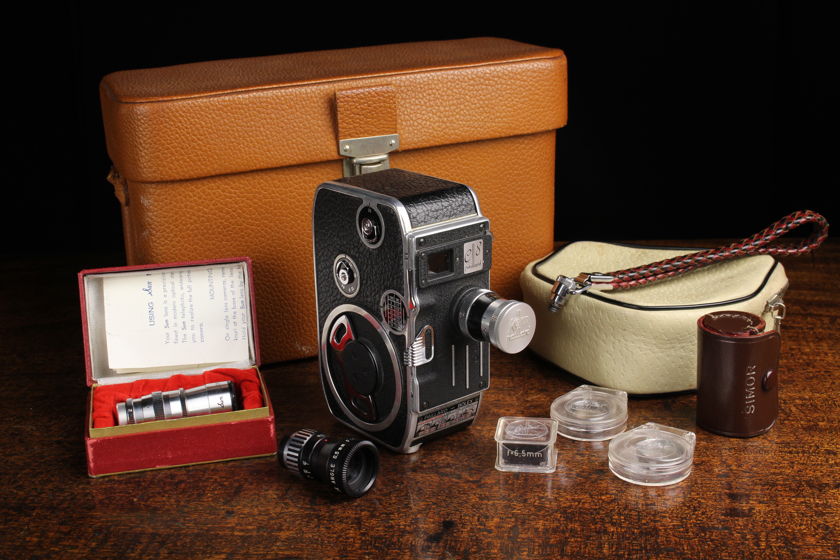 A Vintage Swiss Paillard-Bolex C8 8mm Cine Camera Outfit in near mint condition to include two