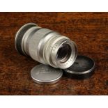 A Leitz Elmer 90 mm f 4 lens No 1082814 with lens cap and back cap [working].