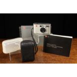 A Leica C2 35 mm Camera with Leica Vario-Elmer 35-70 mm, leather case and plastic case,
