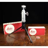 A Leica 14100 Table Top Tripod and a Leica 14121 Tripod Column, [both boxed and in mint condition].