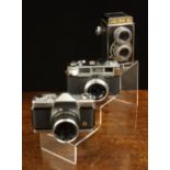 Three Vintage Japanese 1960's Cameras: A Kowa Model E 35 mm Camera with Kowa 50 mm f 2 lens,