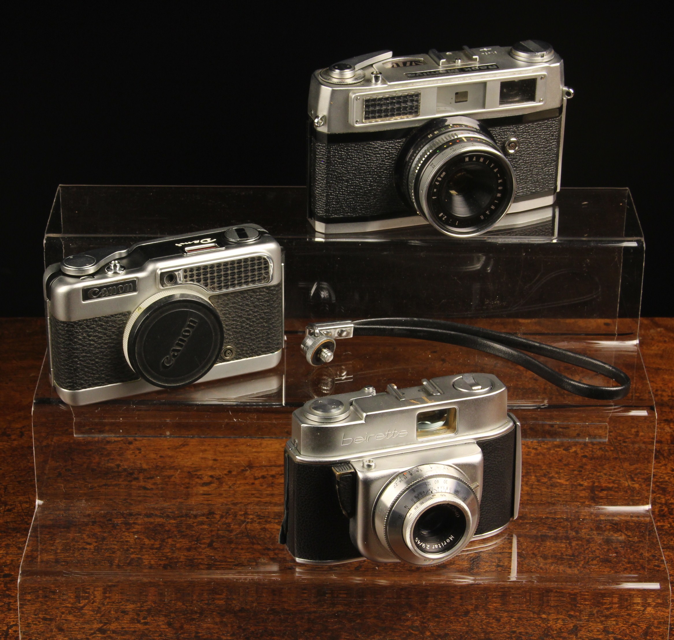 Three Vintage Cameras from the 1960's: A Canon Demi S, A Half-frame Camera with 28 mm f 2.