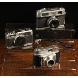 Three Vintage Cameras from the 1960's: A Canon Demi S, A Half-frame Camera with 28 mm f 2.