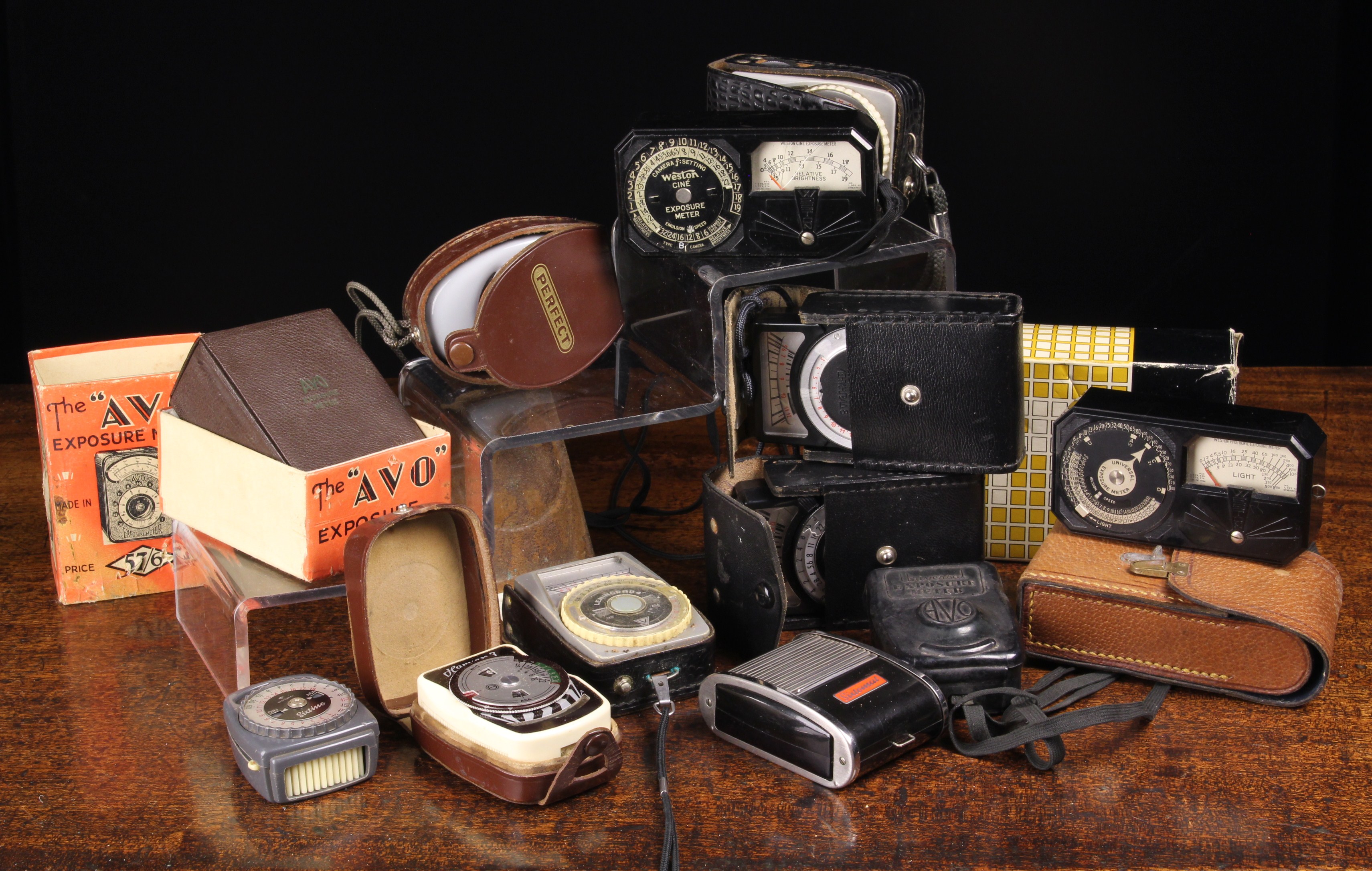 A Collection of Vintage Light Meters to include: Two early Avo meters (one with original box and